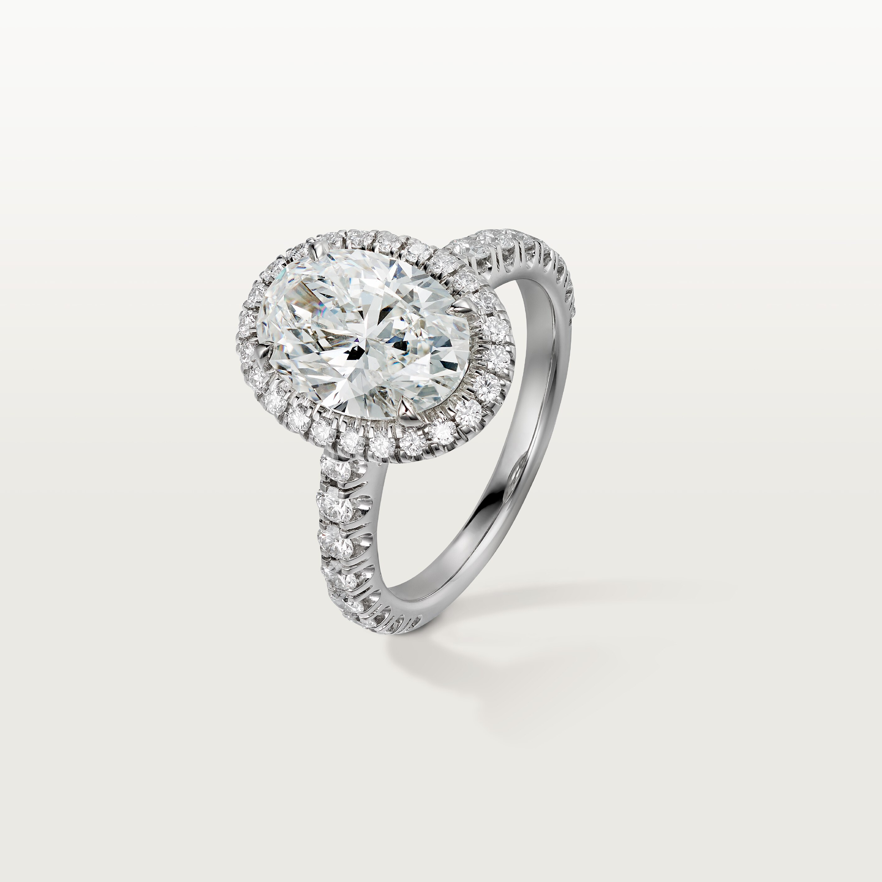Cartier Destin&eacute;e solitaire, oval-cut diamond, paved 