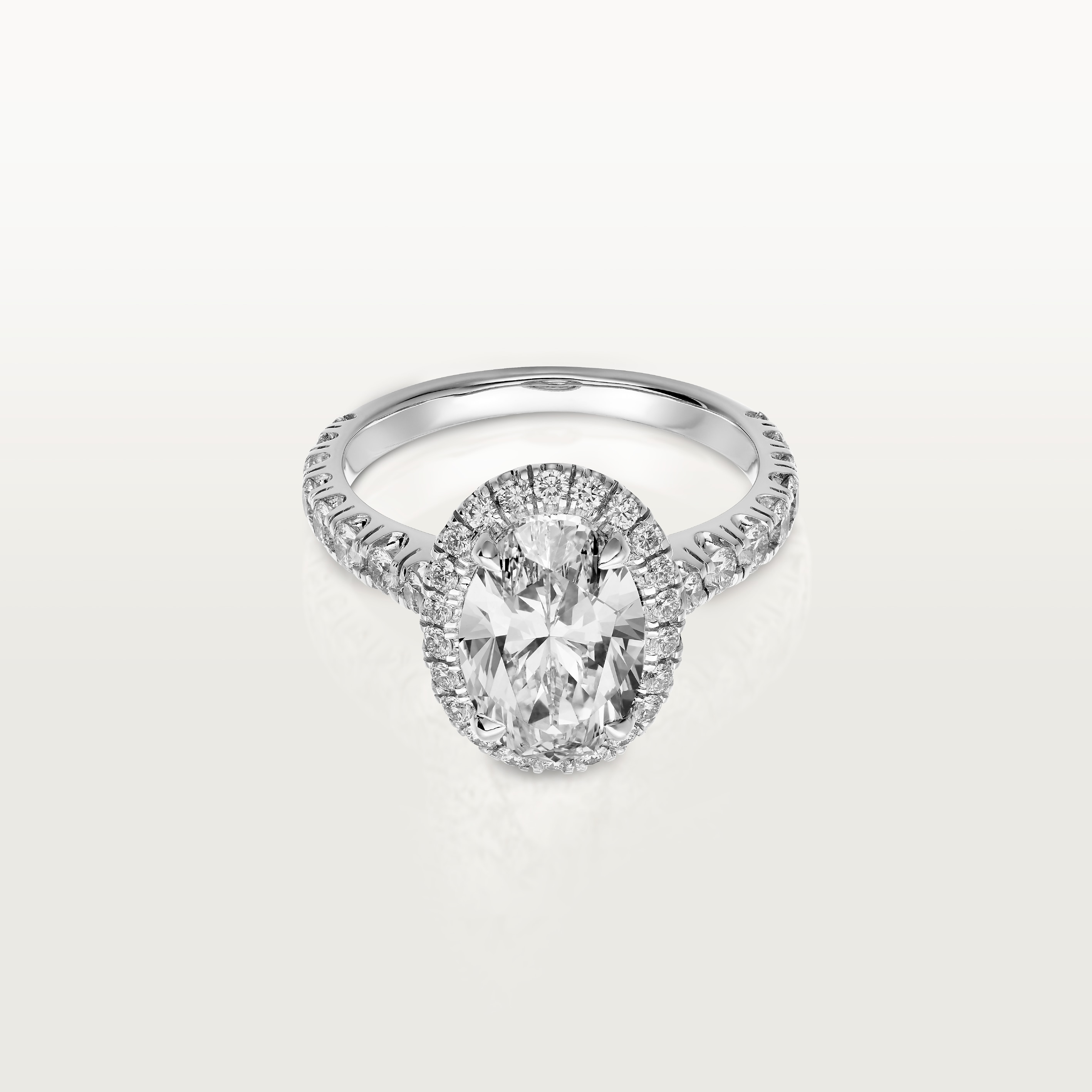 Cartier Destin&eacute;e solitaire, oval-cut diamond, paved 