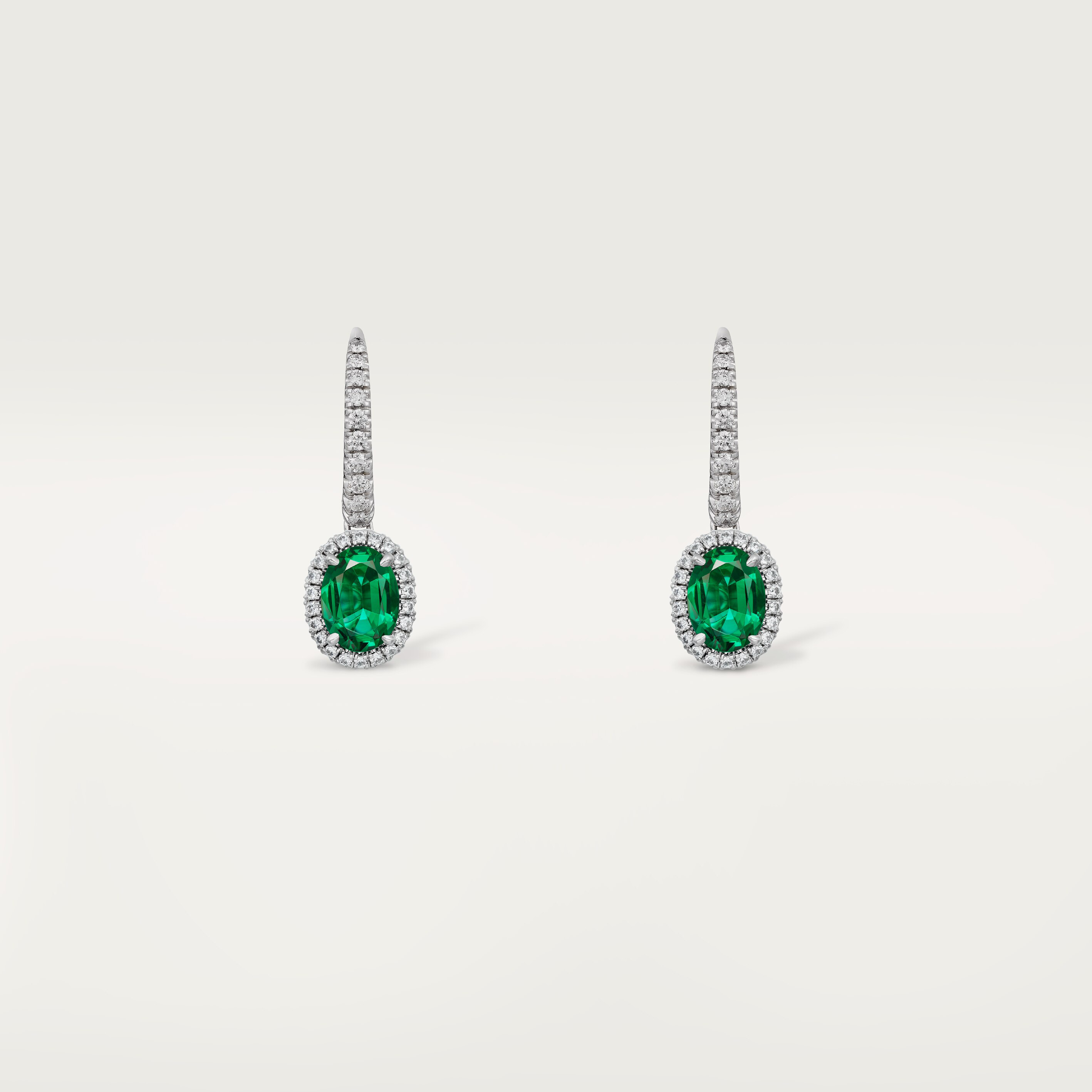 Cartier Destin&eacute;e sleeper earrings, 2 oval-cut emeralds, paved
