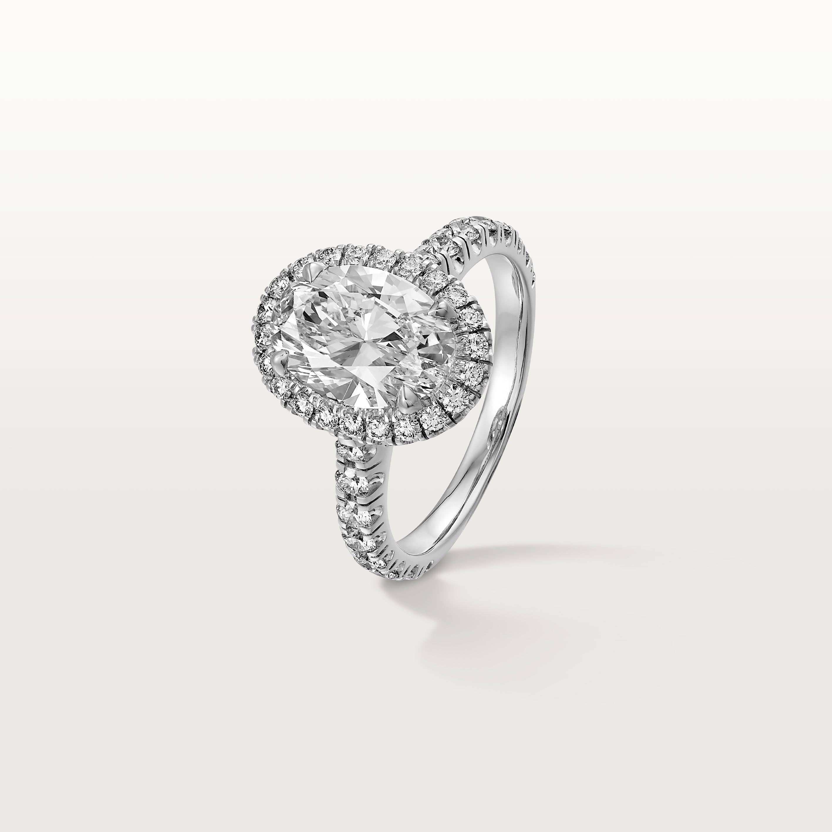 Cartier Destin&eacute;e solitaire, oval-cut diamond, paved 