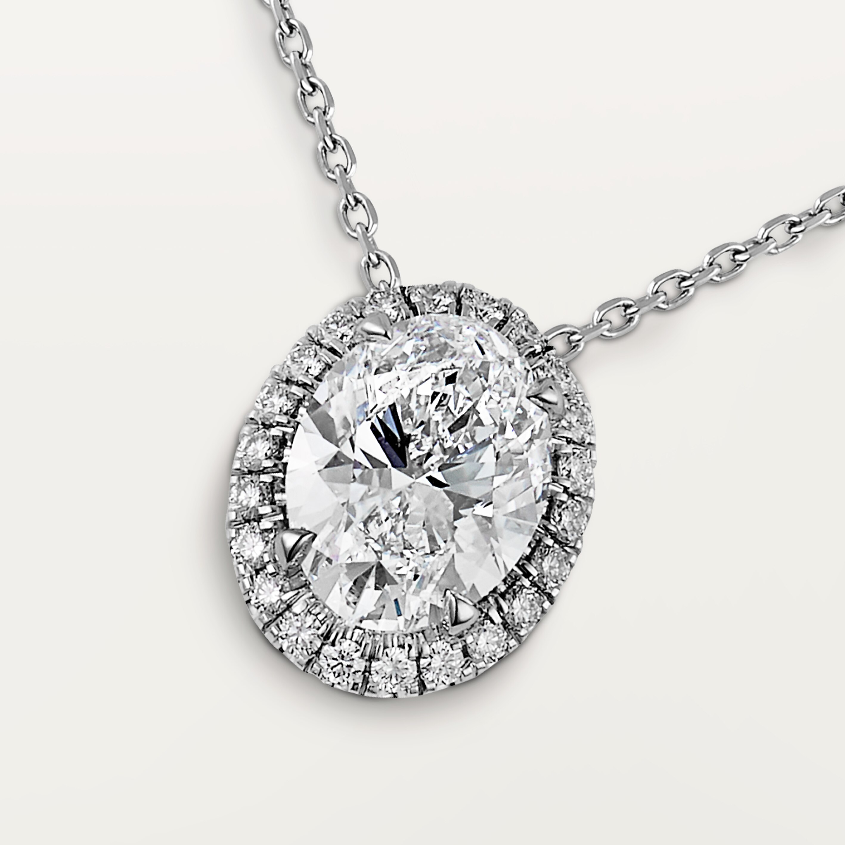 Cartier Destin&eacute;e pendant, oval-cut diamond, paved 