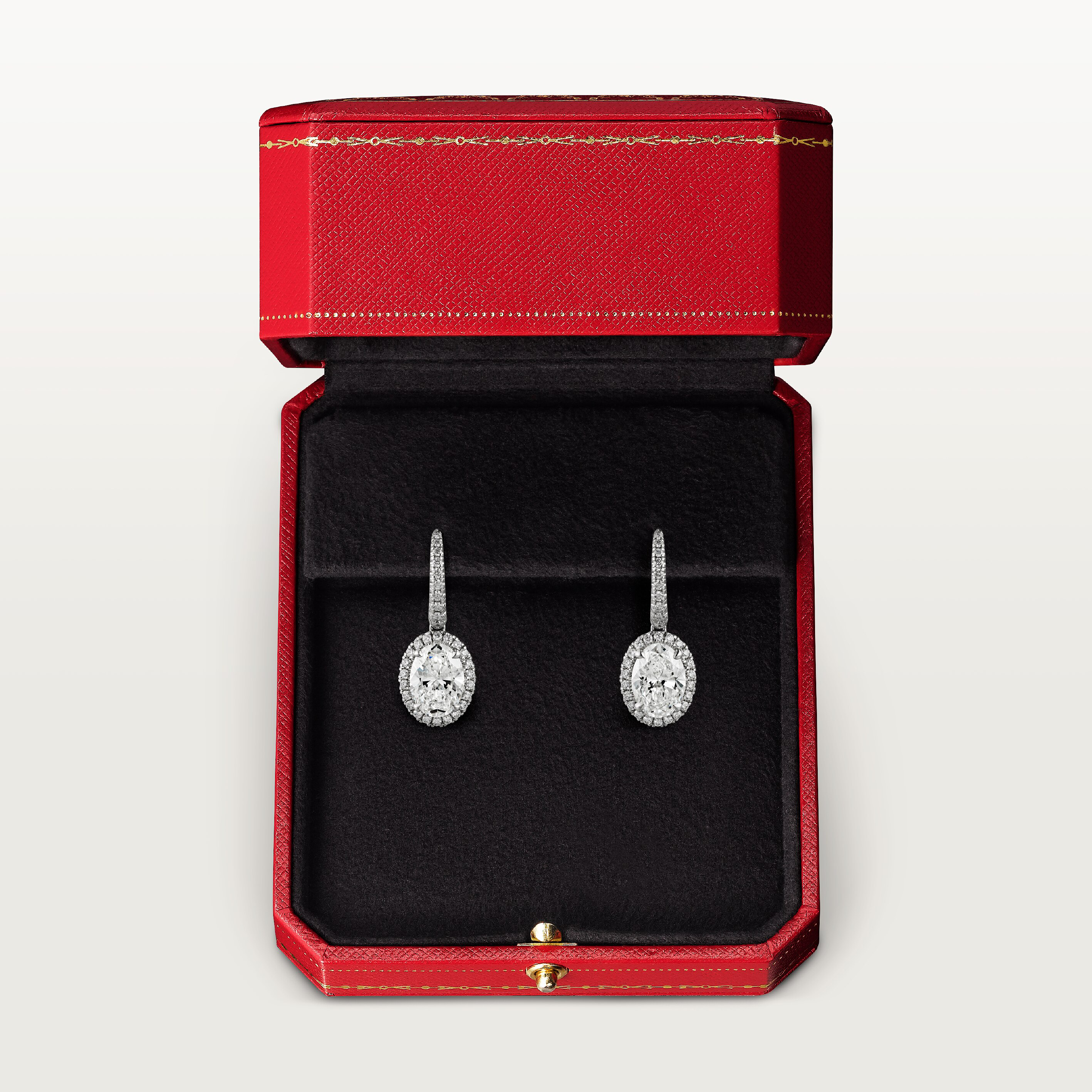 Cartier Destin&eacute;e sleeper earrings, 2 oval-cut diamonds, paved 