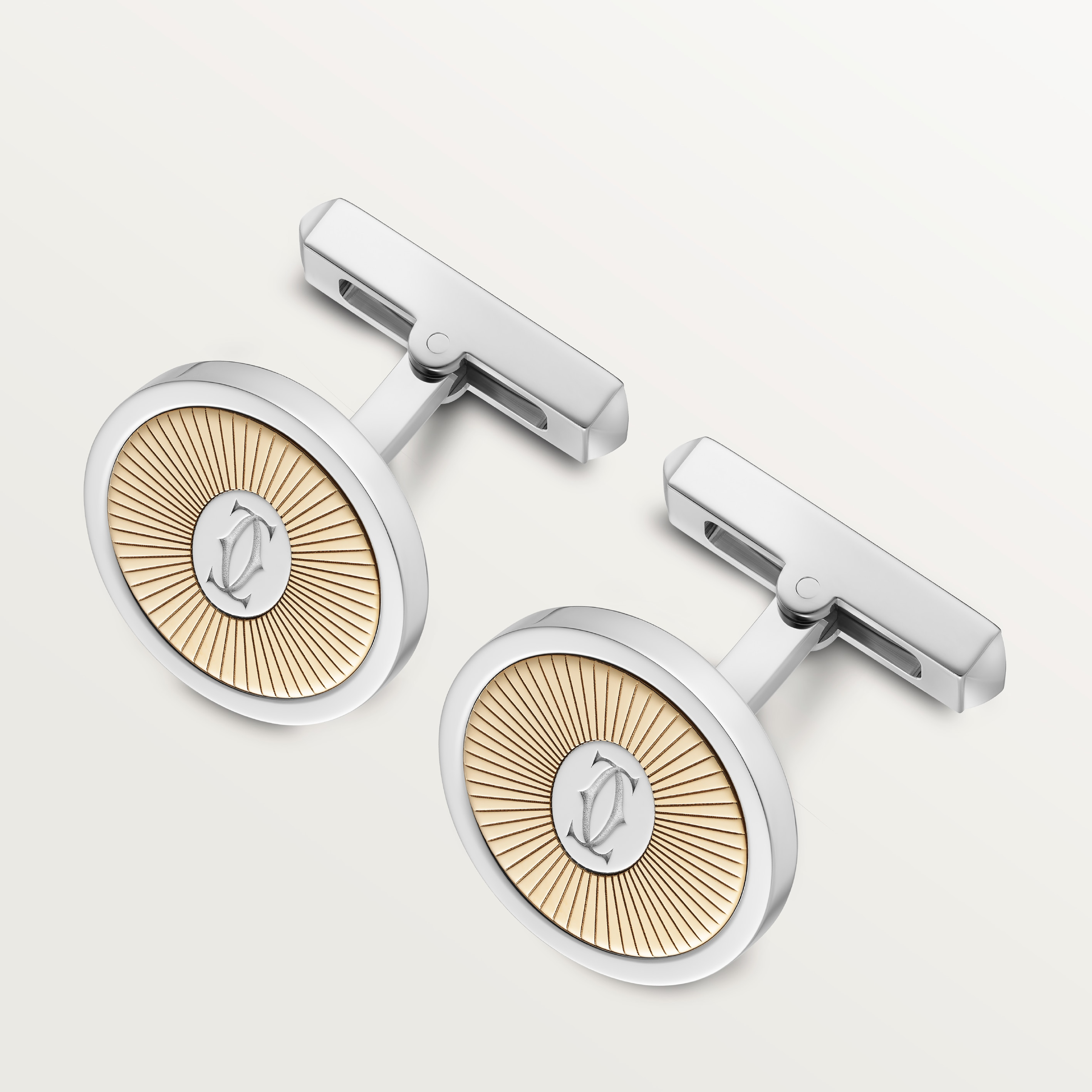 Double C de Cartier logo cufflinks with gold and silver Sunray motif