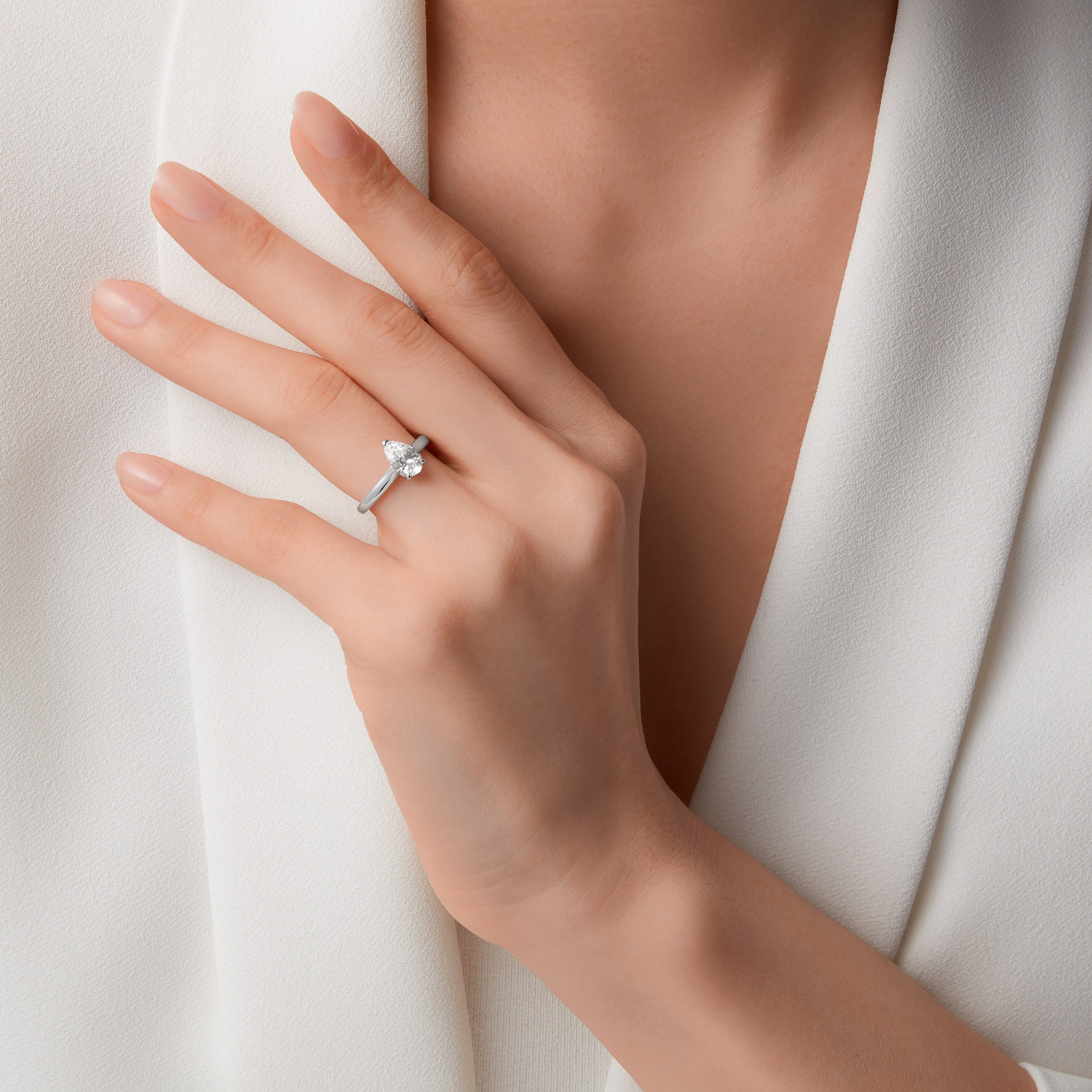 1895 solitaire, pear-shaped diamond