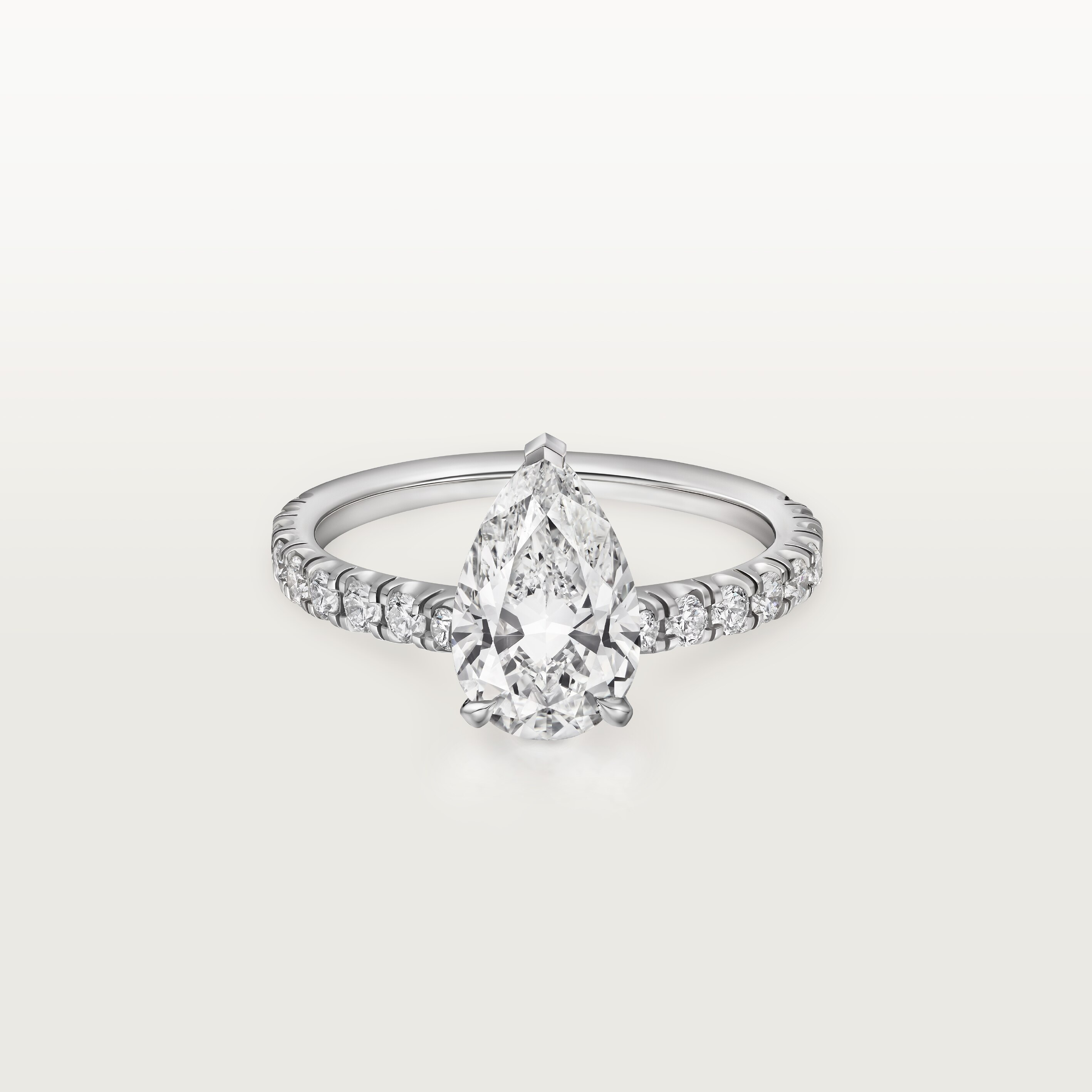 1895 solitaire, pear-shaped diamond, paved